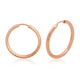 Boucles d'oreilles créoles torsadées en argent avec rose